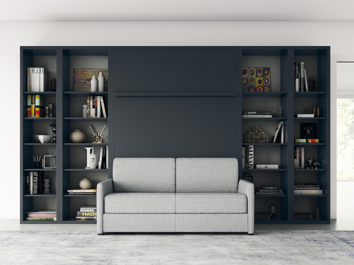Cama abatible con sofá integrado, estantería y mesa plegable para