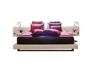 Character, Cama con amplio cabecero y acolchado capiton�.