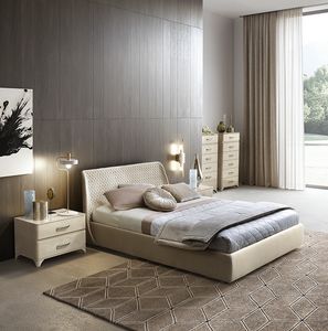 Kleo cama, Cama tapizada con cabecero envolvente