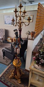 Art. Moro Florence, Estatua del titular de las velas, con un sabor clsico