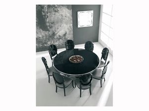 SENSUAL, Brillante mesa lacada en negro, con detalles de la hoja de plata