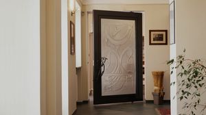 BAI.06, Puerta con marco de acero, con panel de vidrio fundido